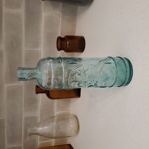 Himark Tall Embossed Decorative Green Glass Bottle